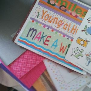 Large flat rate box of 12x12 scrapbook papers.